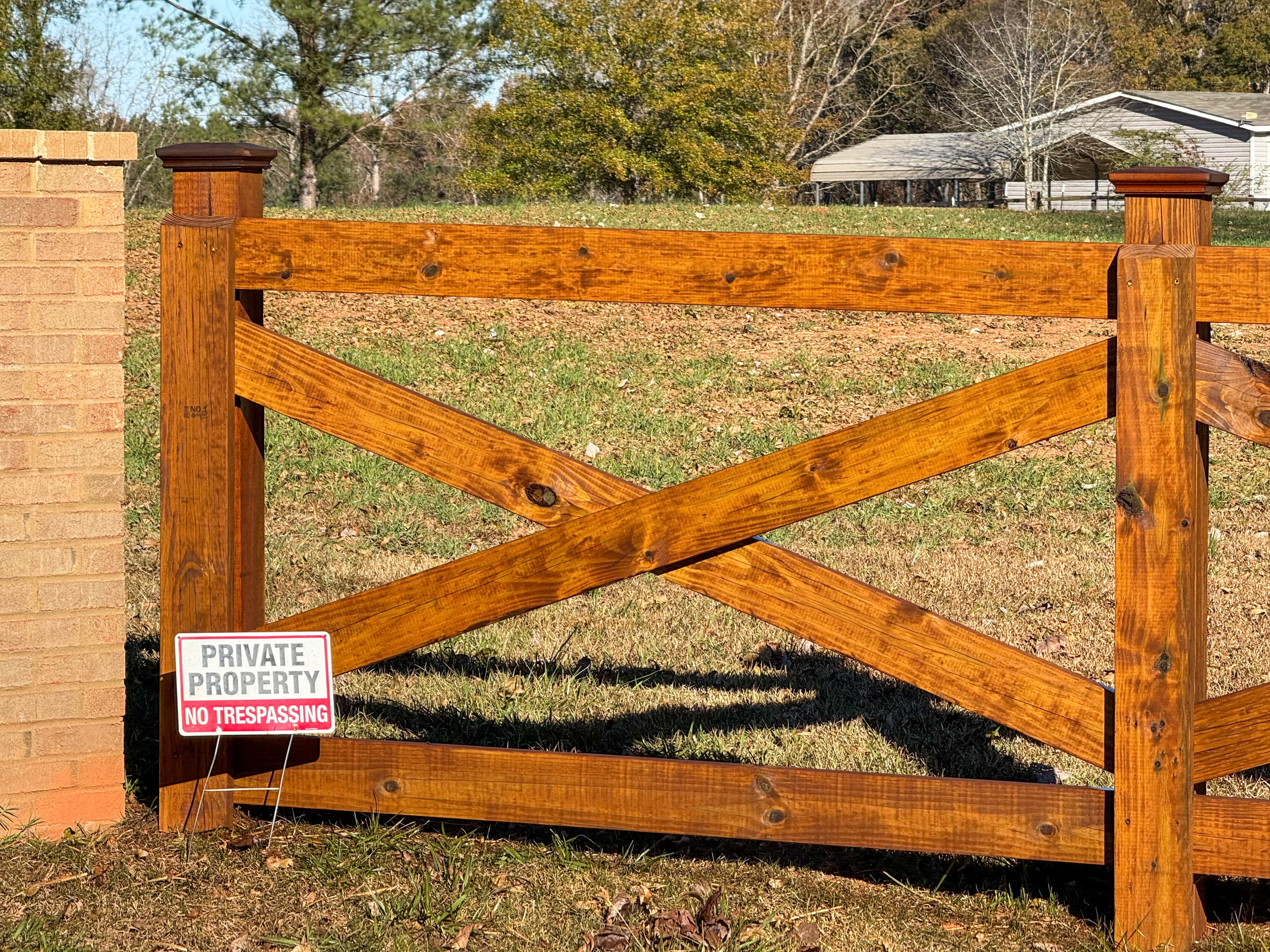 Stained farm fence