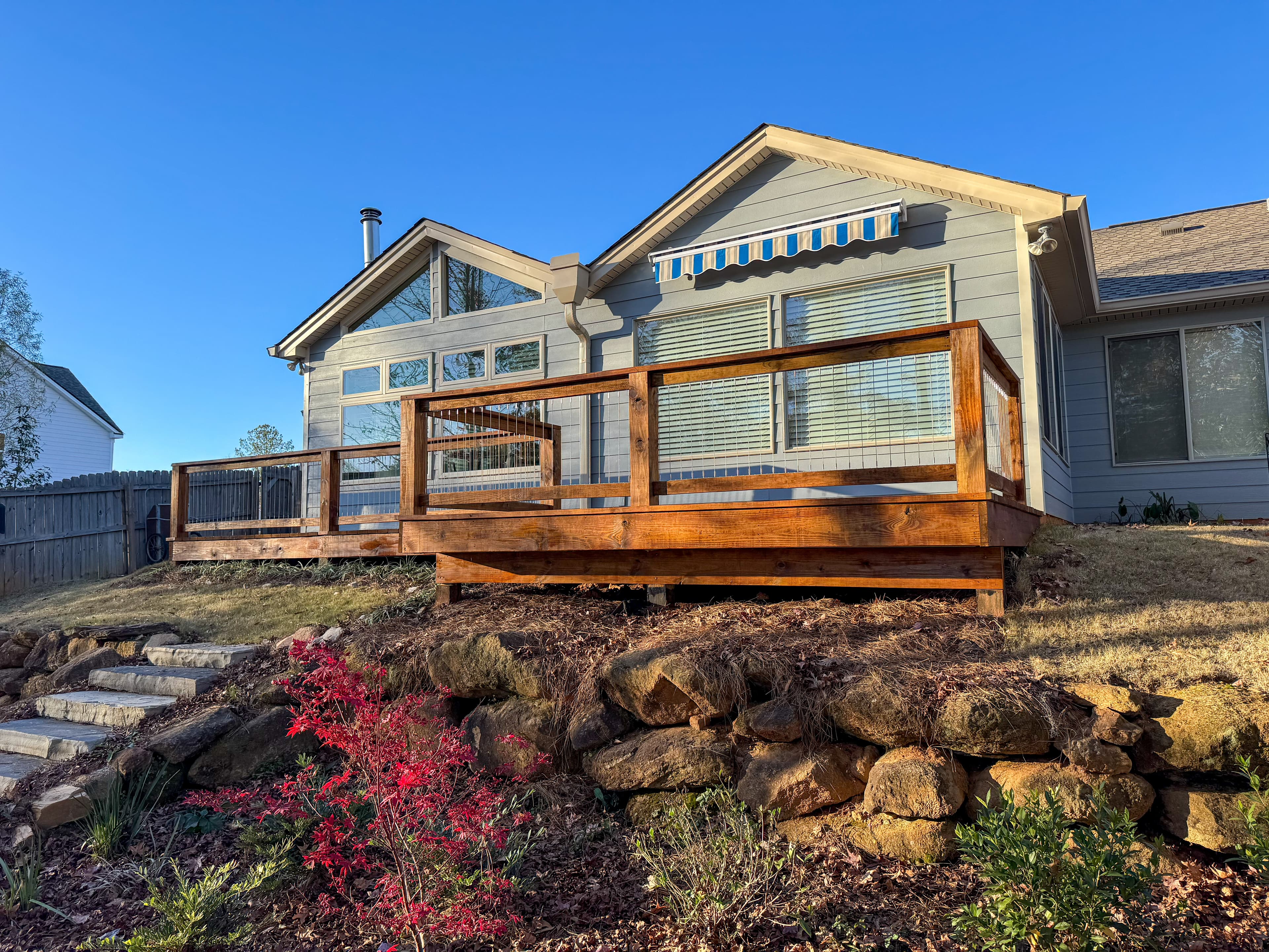 Stained deck with cable railings