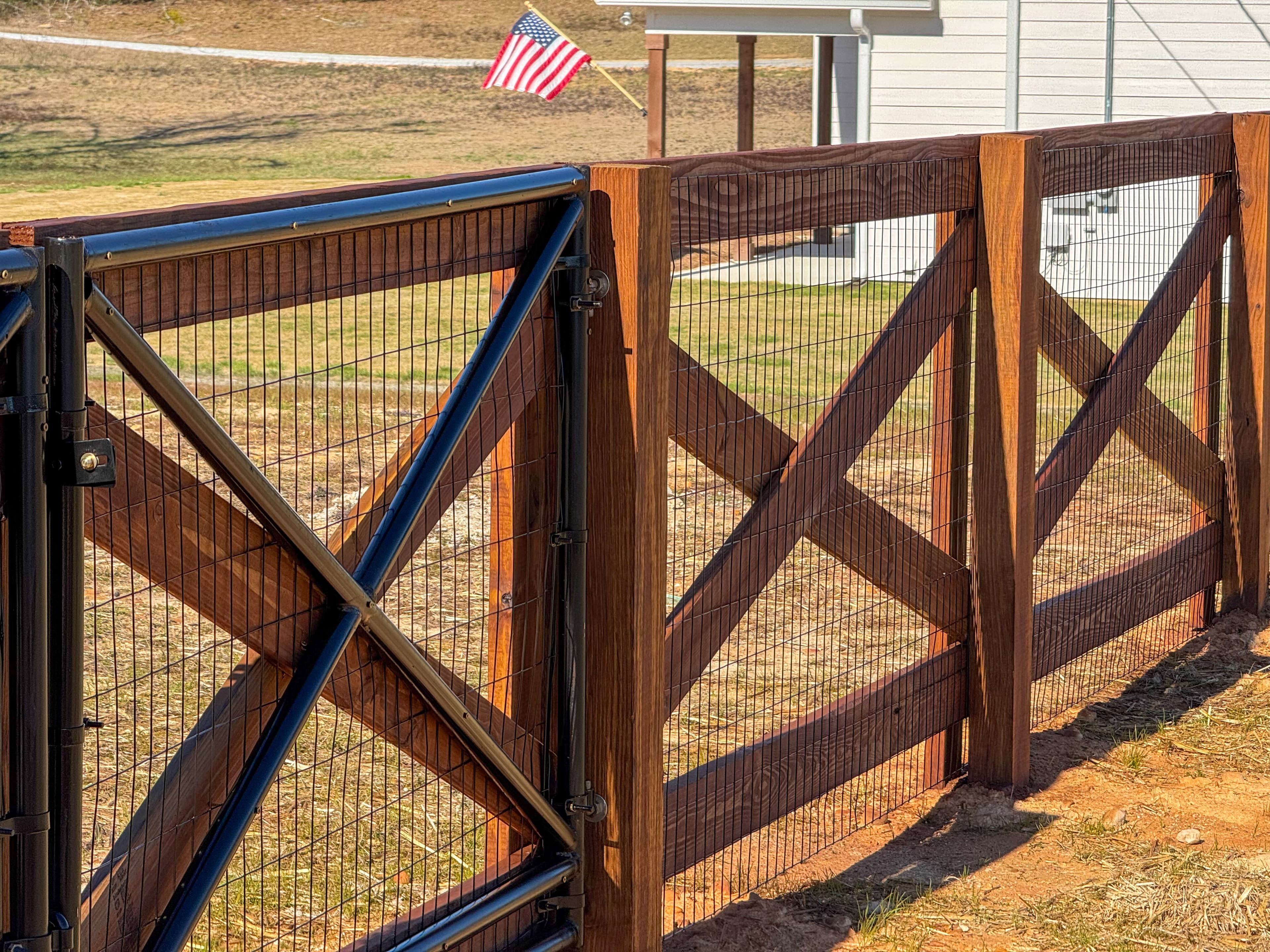 Stained farm fence