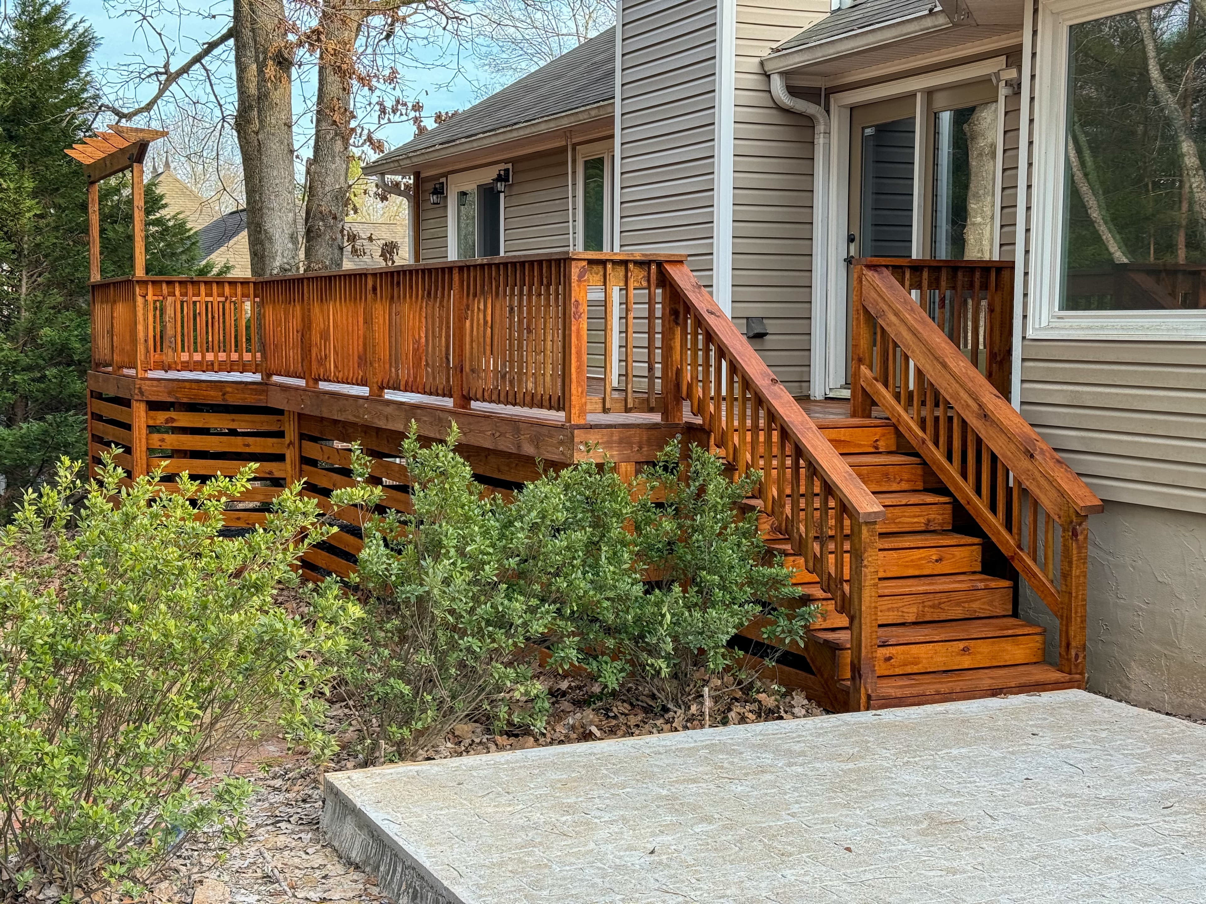 Stained deck with pergola