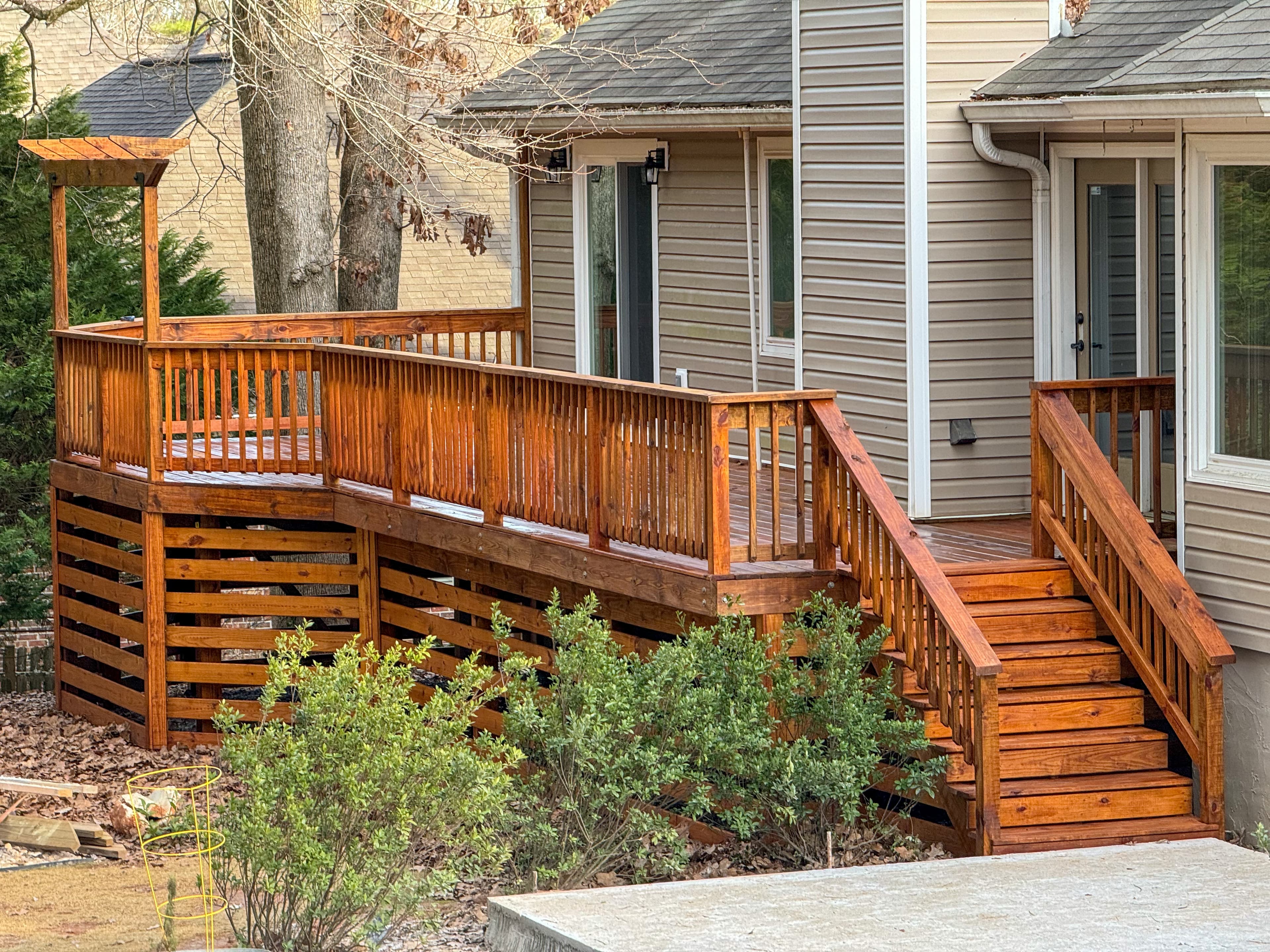 Stained raised deck with railings