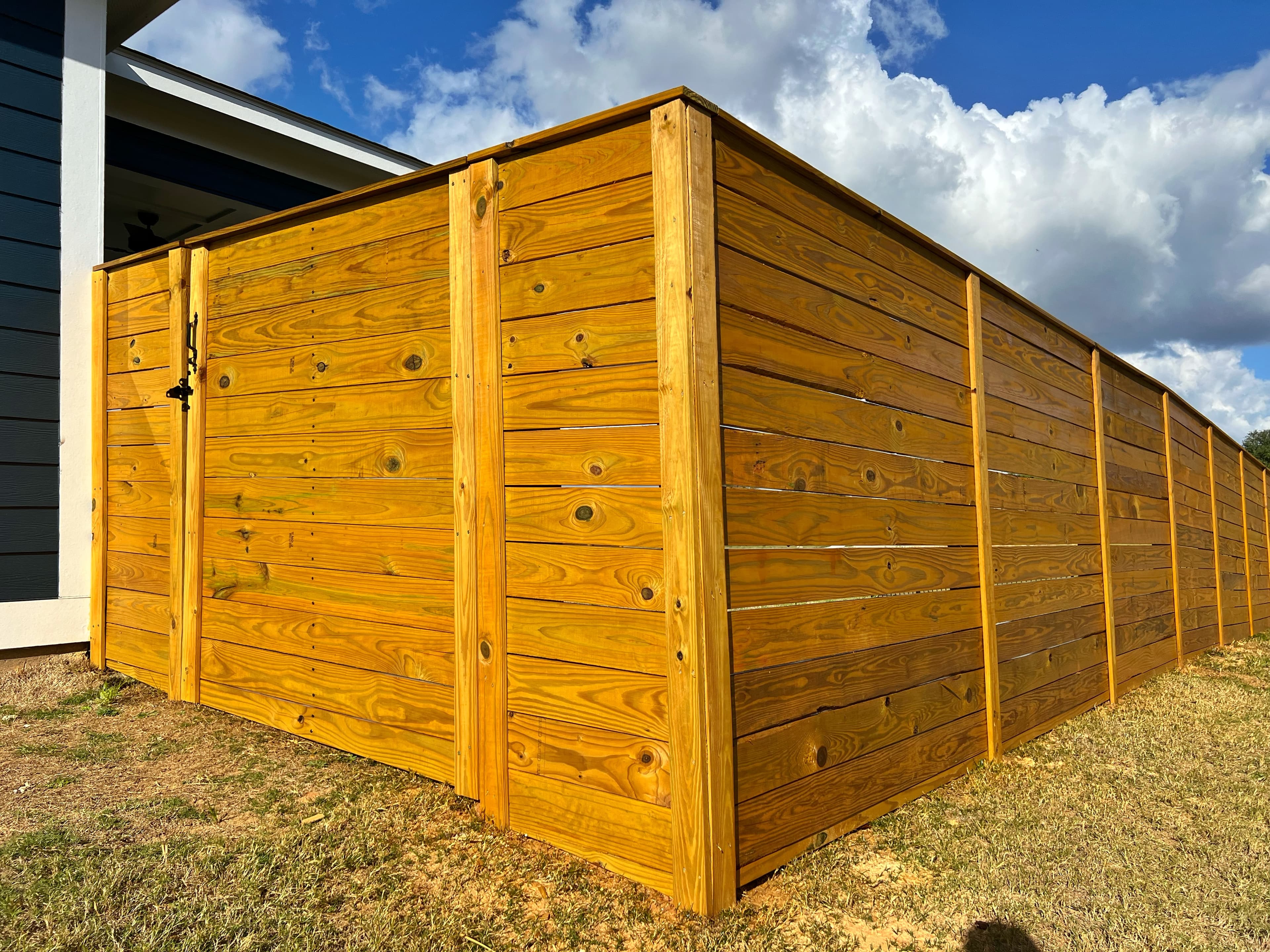 Stained horizontal fence