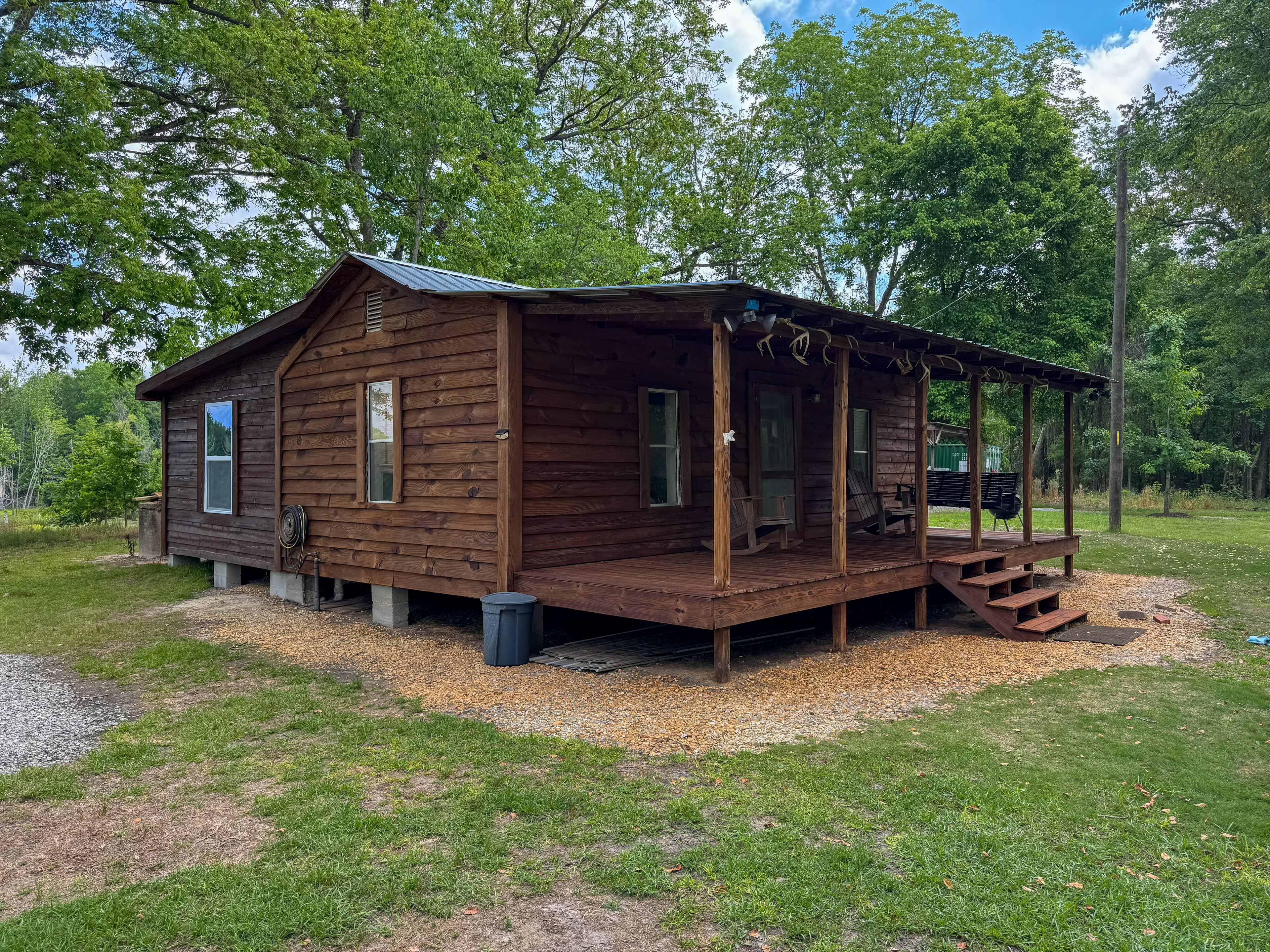 Stained porch and siding