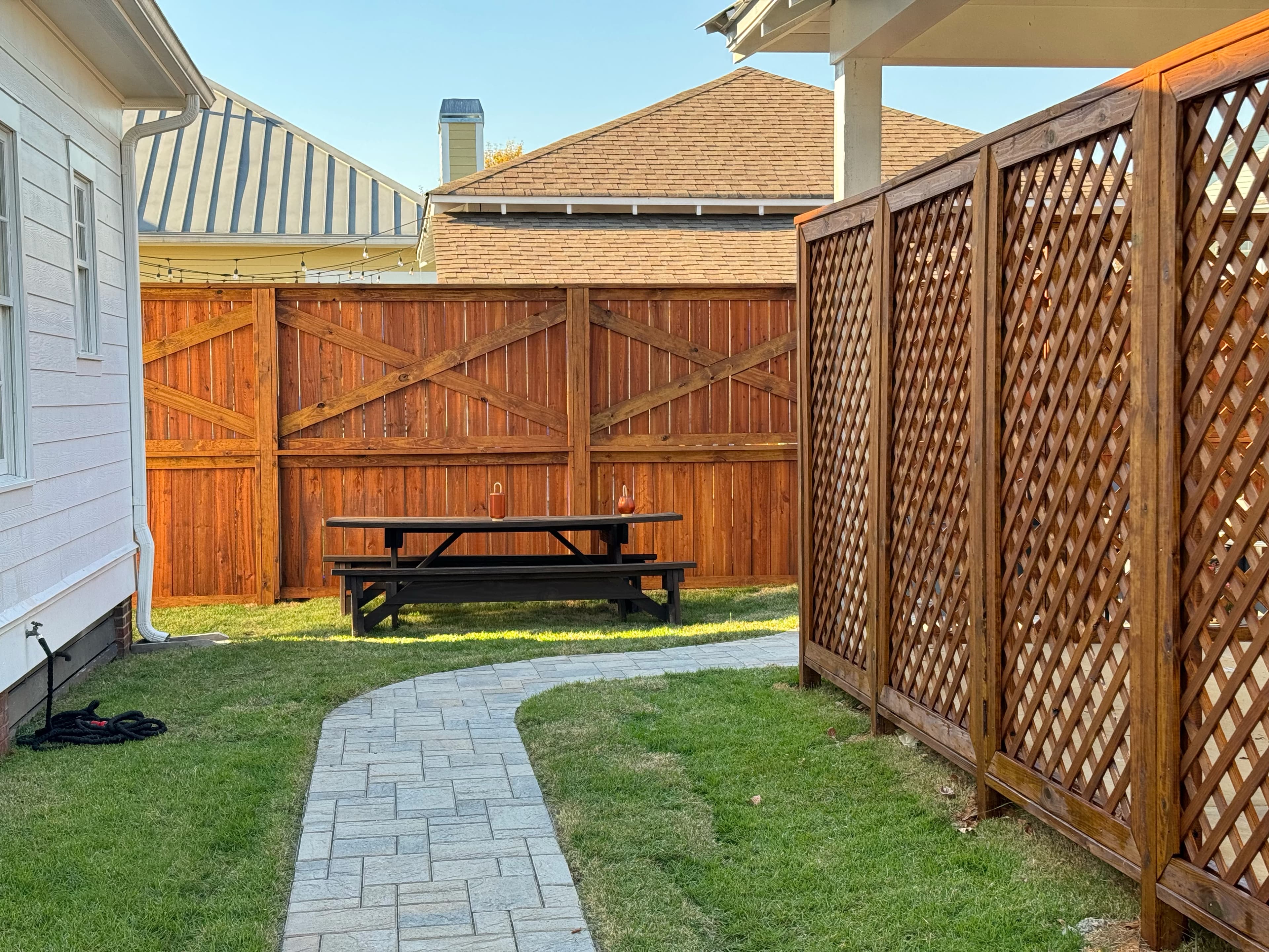 Stained fence enclosure