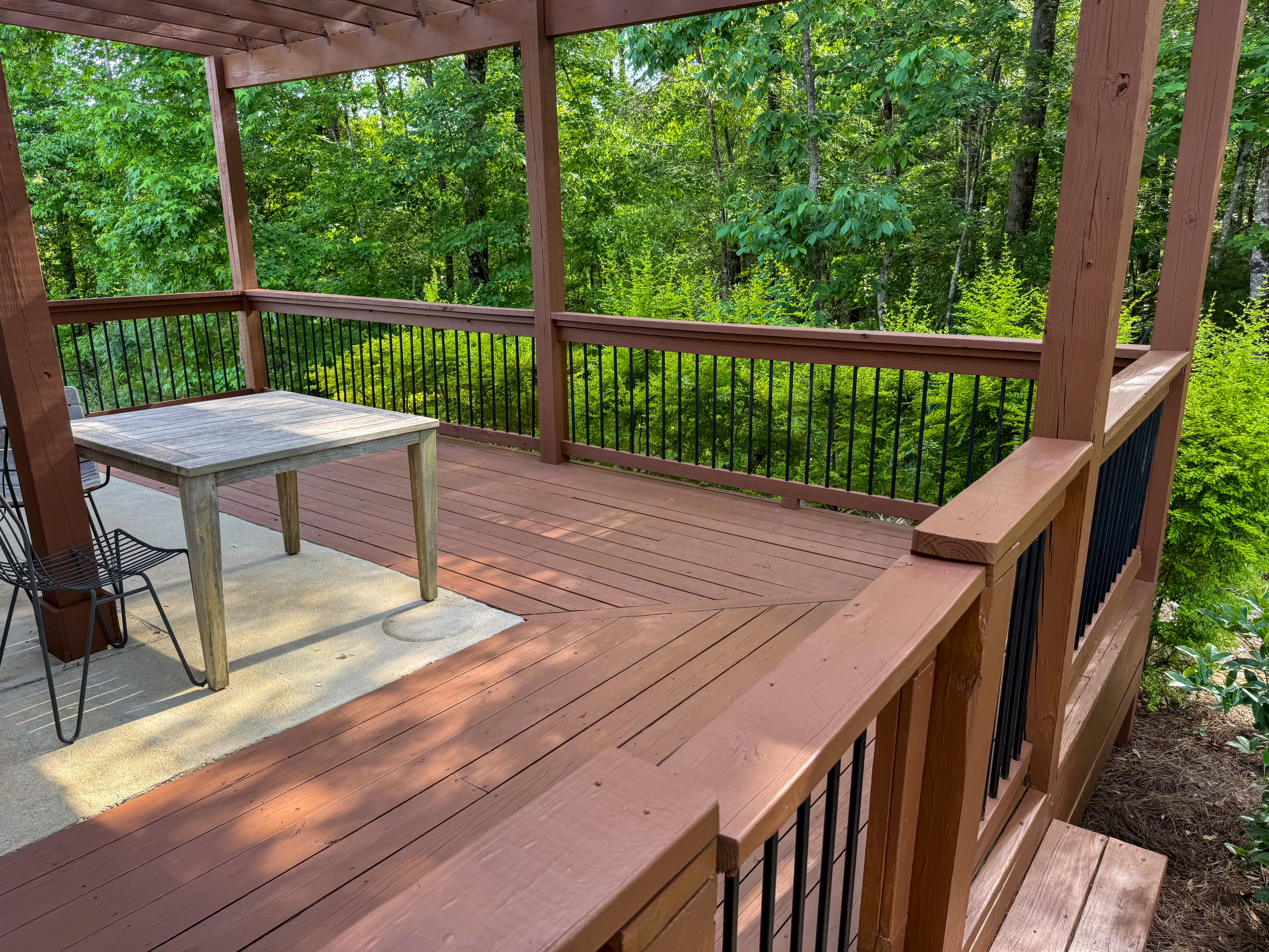 Stained deck with pergola