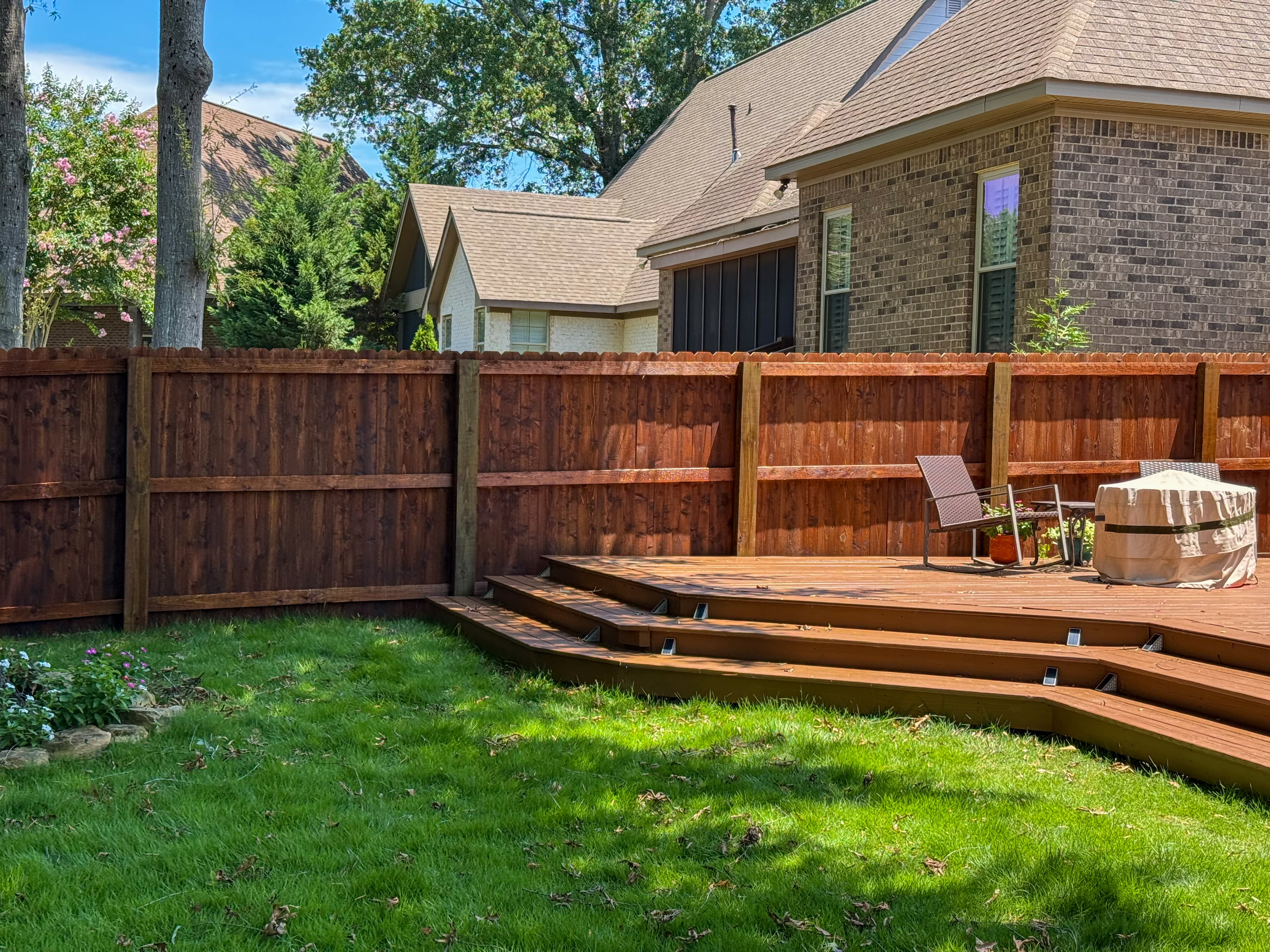 Stained fence and deck