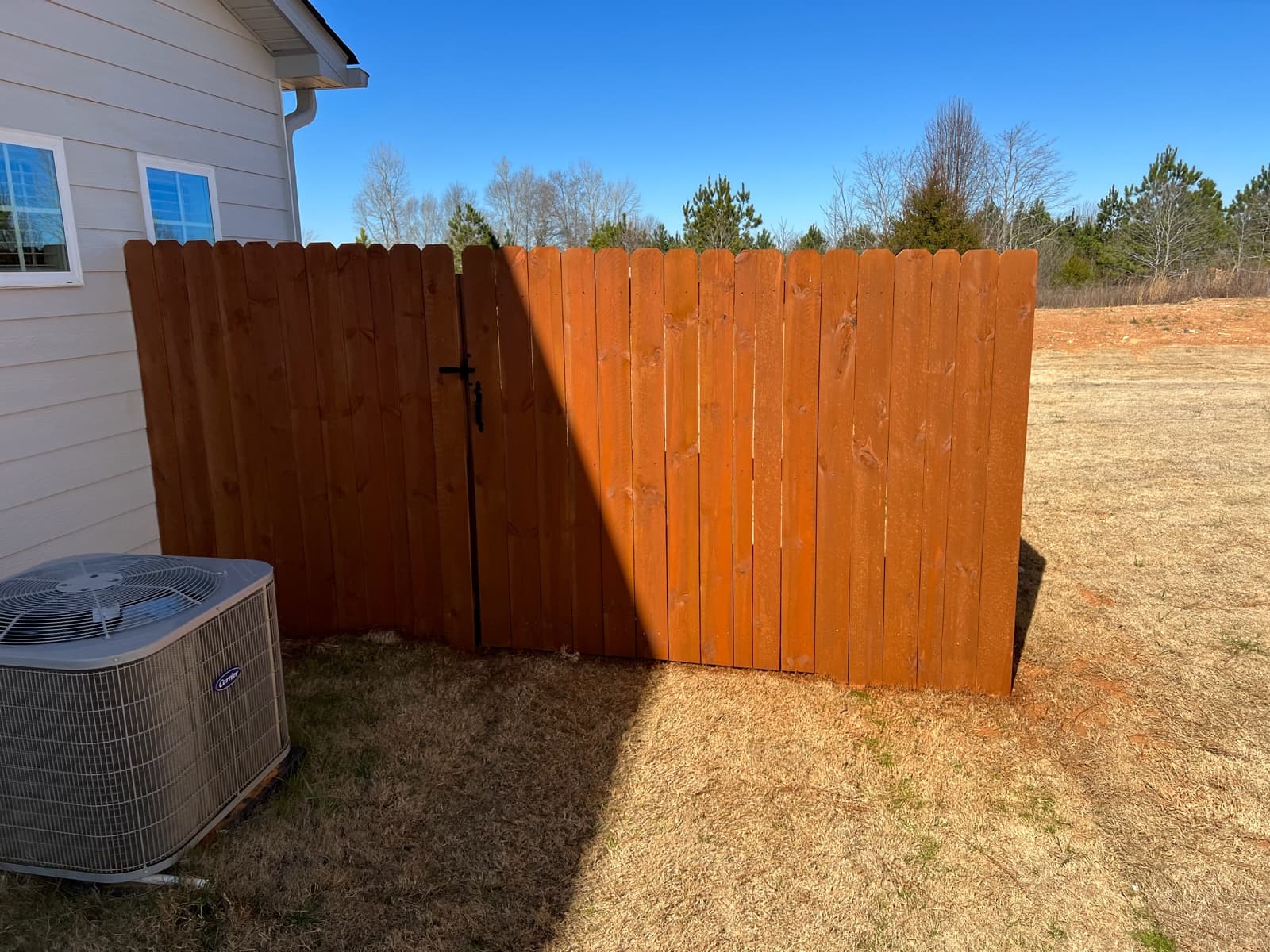 Backyard fence stained in Auburn