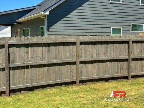 Privacy fence stained in Cape Cod