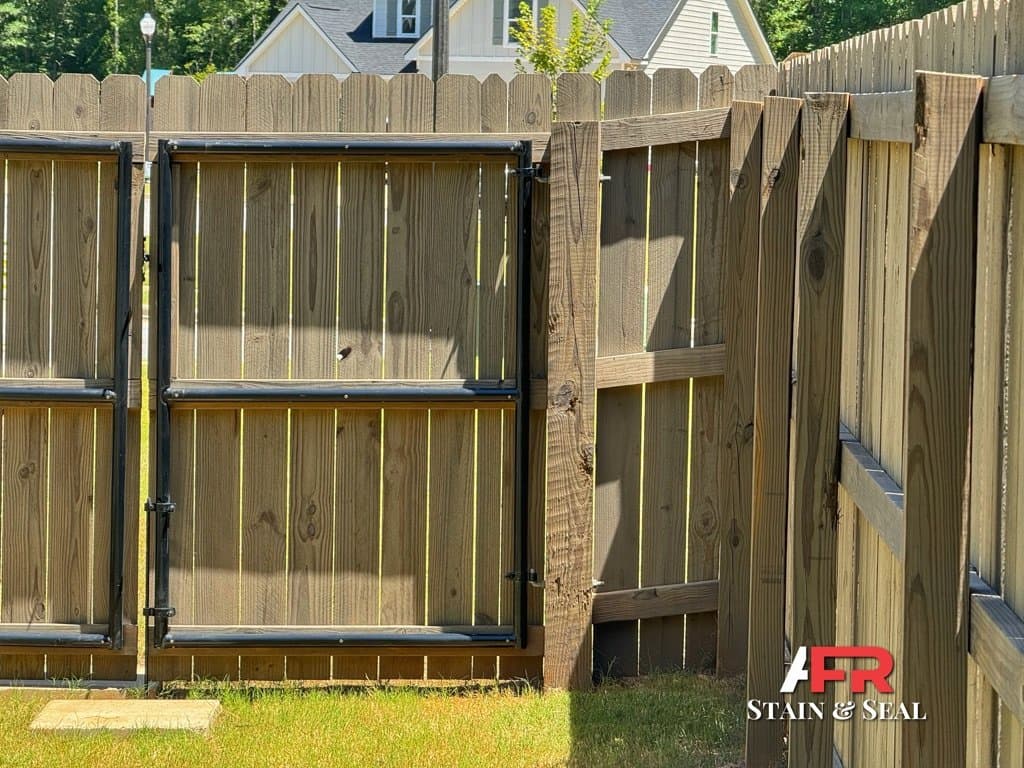 Fence and gate stained in Cape Cod