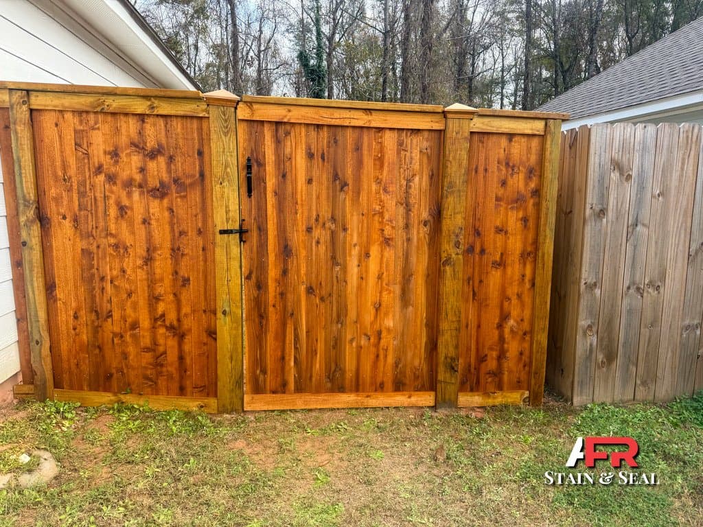Fence gate stained in Cedar