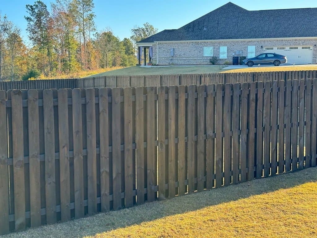 Shadowbox fence stained in Chocolate