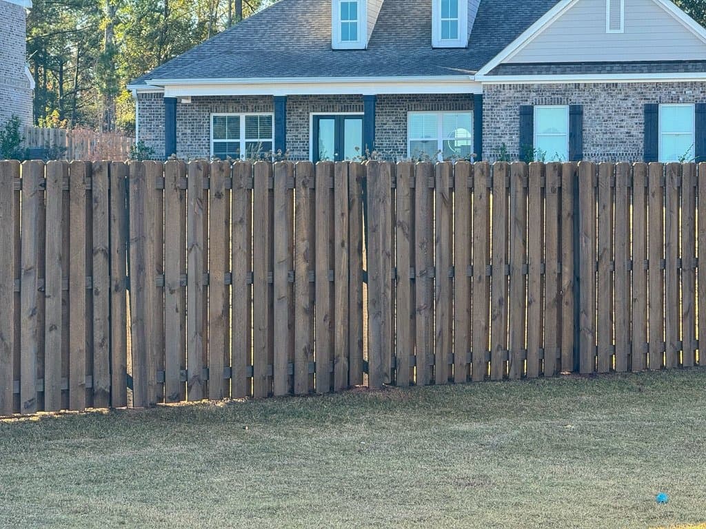 Shadowbox fence stained in Chocolate