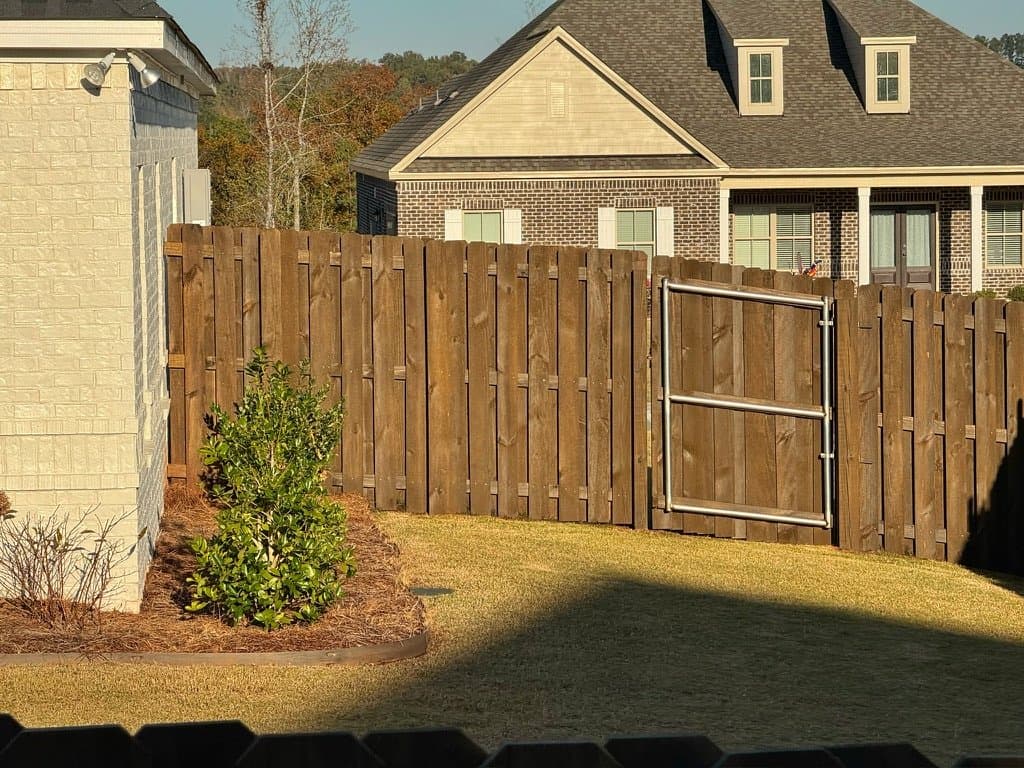 Fence and gate stained in Chocolate