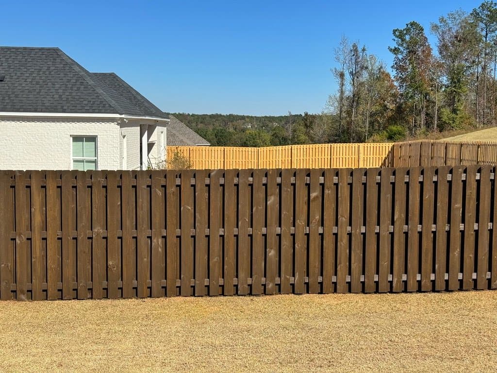 Shadowbox fence stained in Chocolate