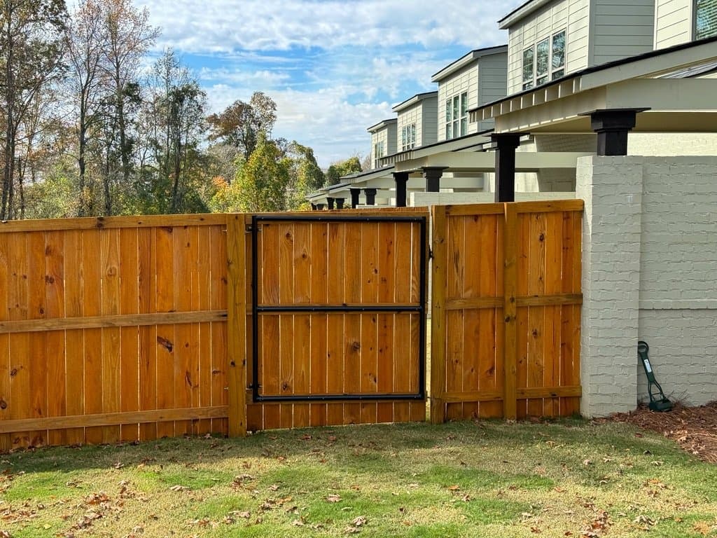 Fence and gate stained in Honey
