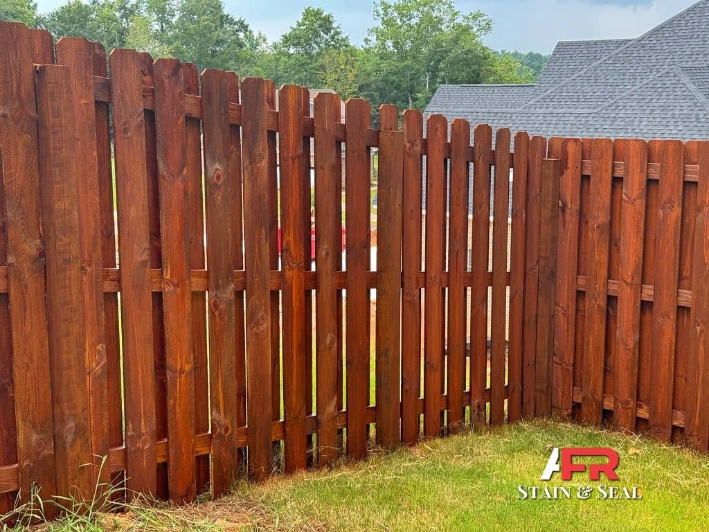 Fence stained in Mahogany