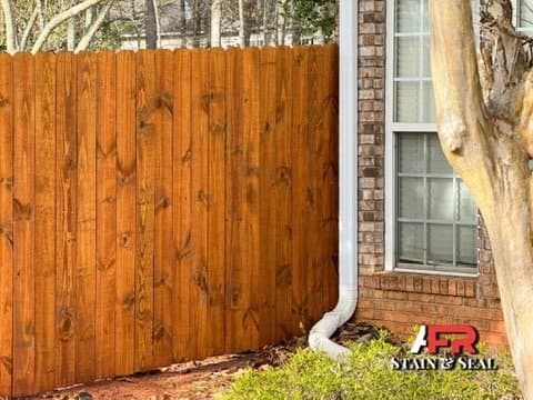 Privacy fence stained in Pecan