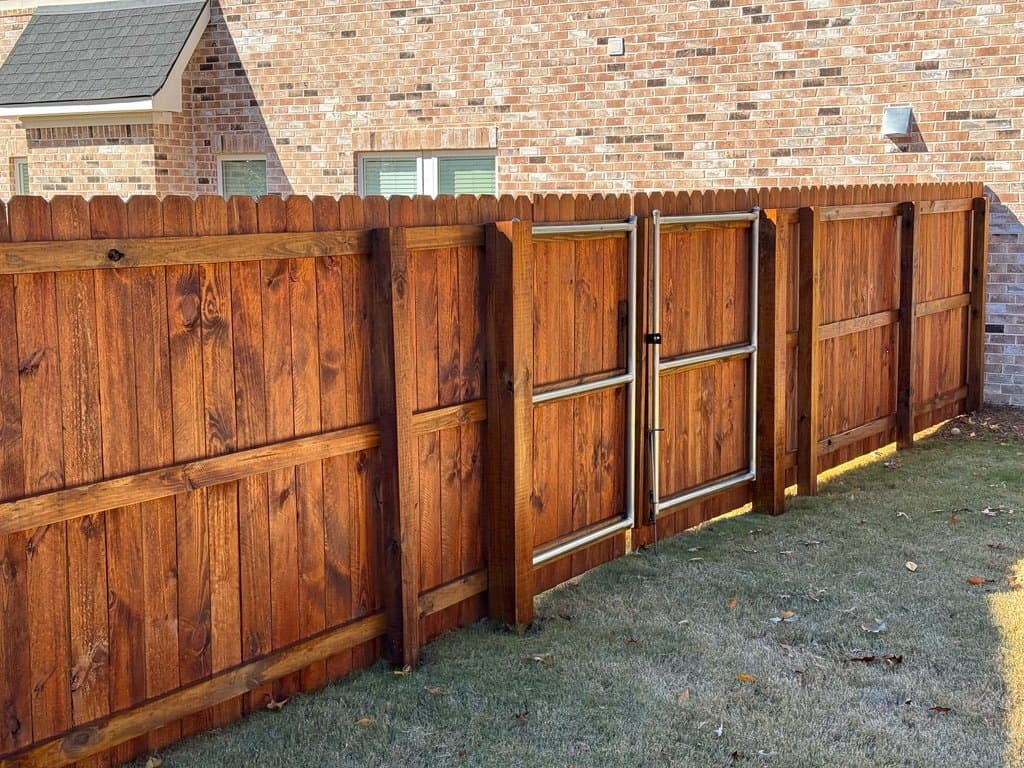 Fence and gate stained in Pecan