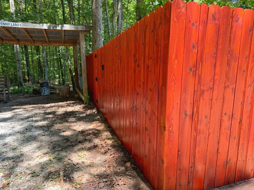 Privacy fence stained in Redwood