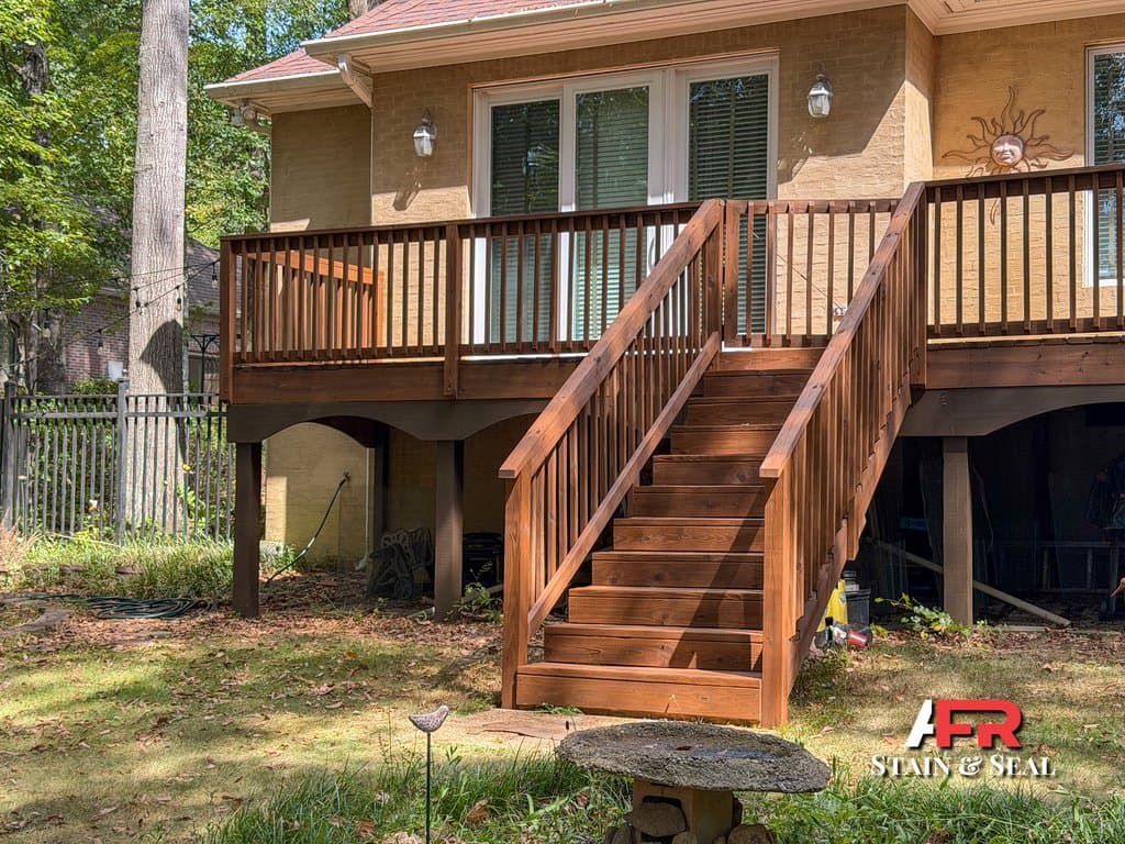 Deck stairs and railing stained in Sable
