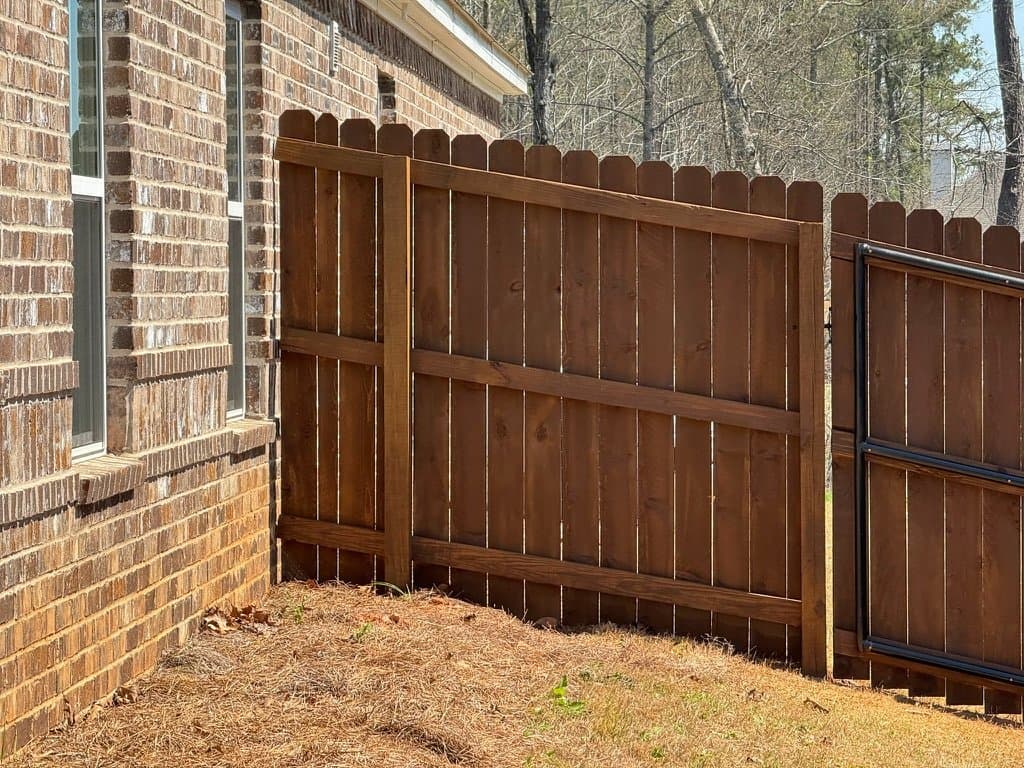 Fence and gate stained in Sable